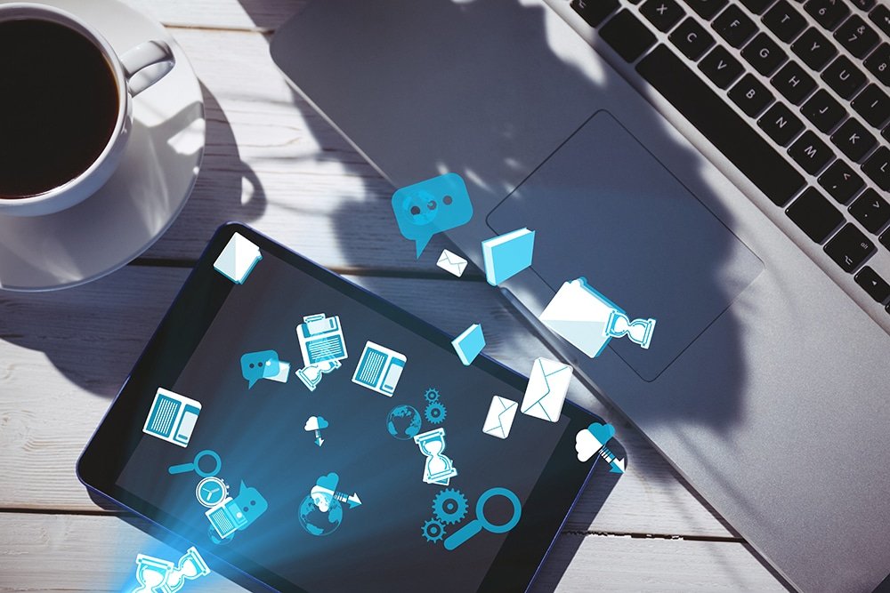 consultoria digital - digital composite of smart devices with coffee on table with graphics